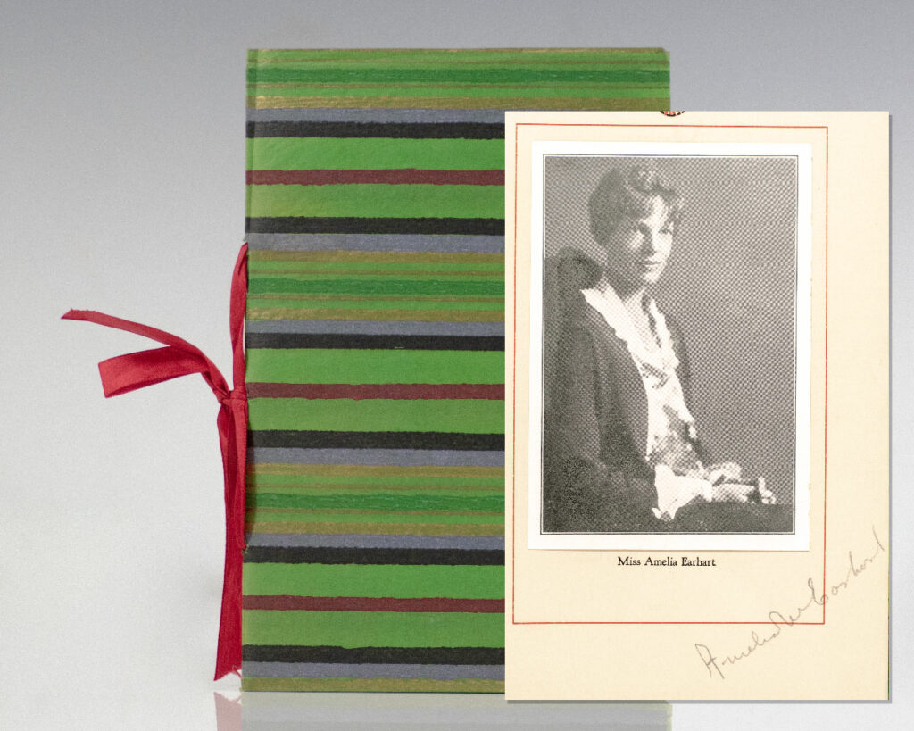 Rare original program from the Christmas Party of the Oldsmobile Girls held on December 19th 1928; signed by legendary aviator Amelia Earhart