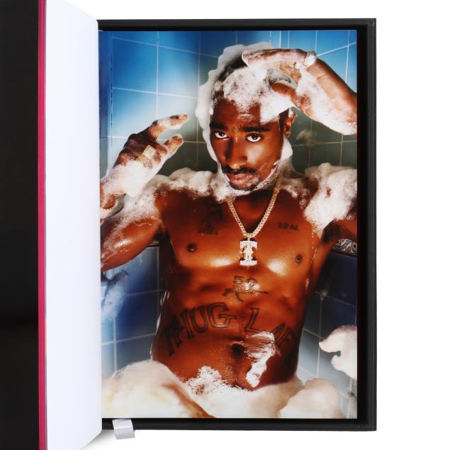 Photograph of a man in a bathtub