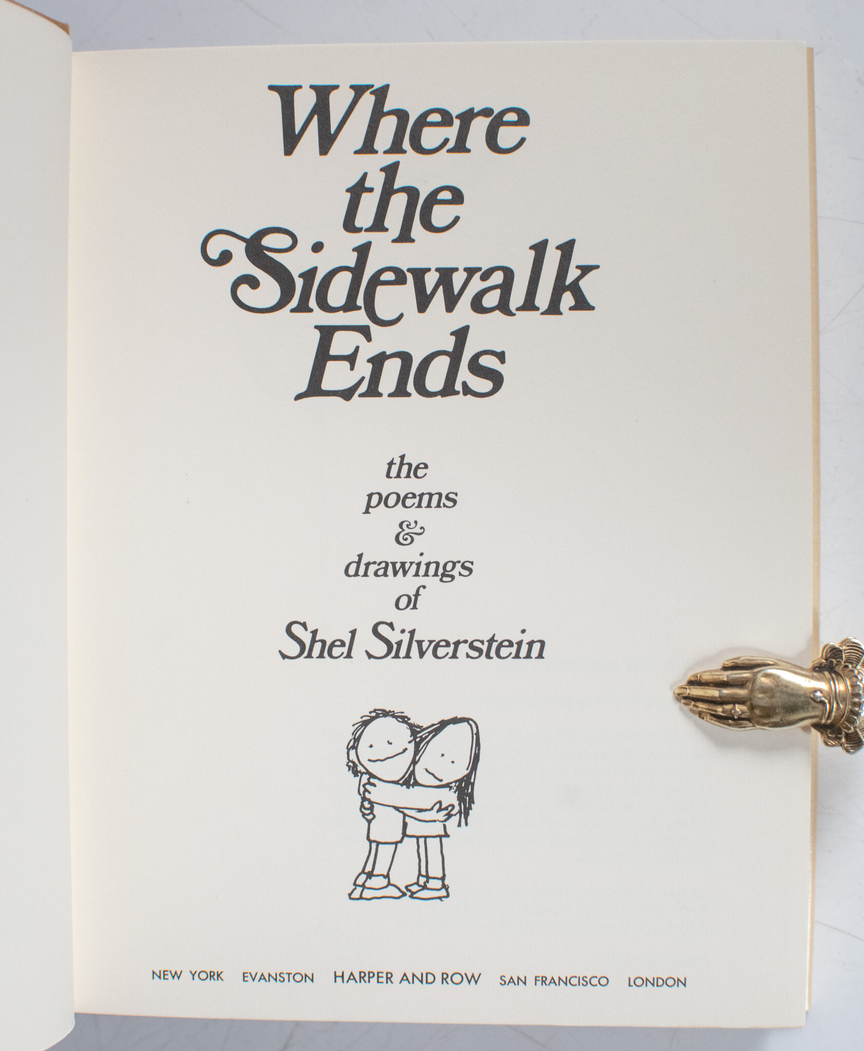 Where the Sidewalk Ends: Poems and Drawings.